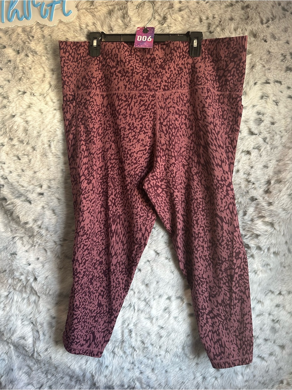 6. Athleta Salutation Stash Pocket II 7/8  tawny rose leopard print. 3x